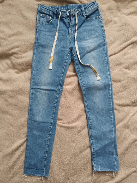 Jeansy damskie .