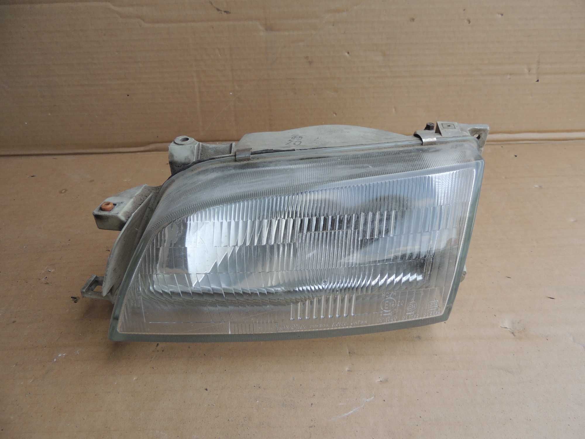 Lampa przednia lewa europejska Toyota Carina E 92,93,94,95,96,97