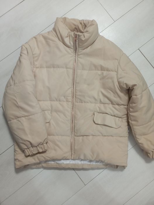 Пуховики і куртки