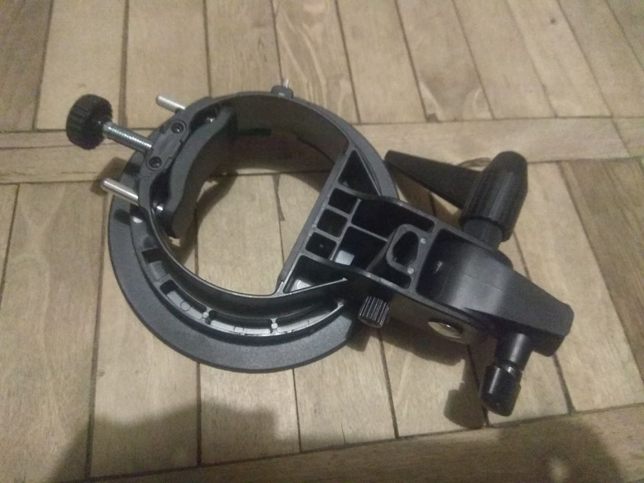 Тримач для спалаху. Фототовари, головка для штативів, деталь.