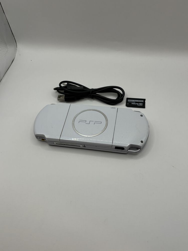 biała konsola PSP 3000 slim + adapter + kabel stan bardzo dobry