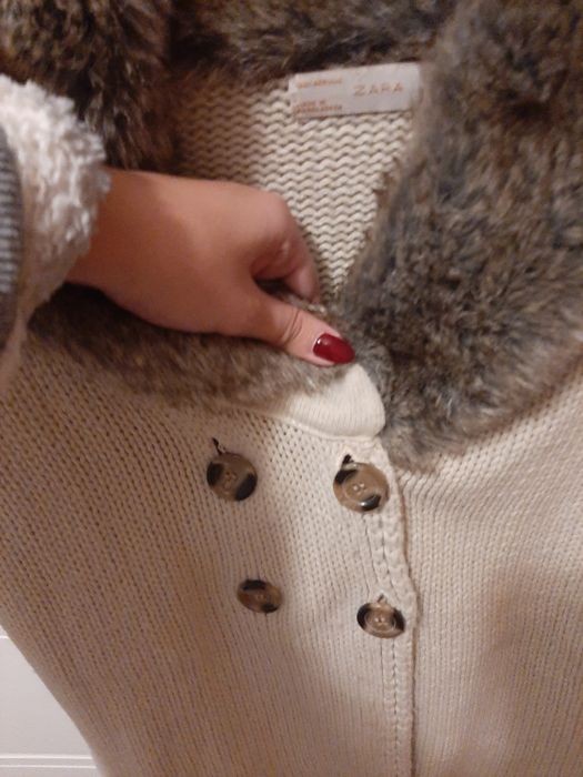 Casaco com pêlo na gola