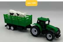 Traktor / traktorek / ciagnik z krowa na przyczepie