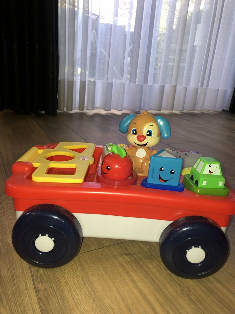 Fisher-price edukacyjny wózek szczeniaka