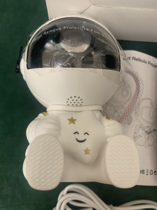 Лазерний нічник проектор зоряного неба «Астронавт»  Космонавт СИДИТ