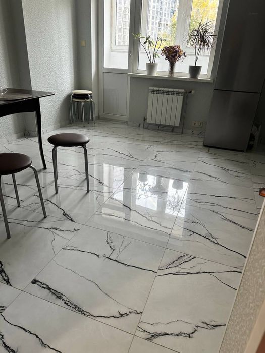 Облицювання плиткою , плиточник