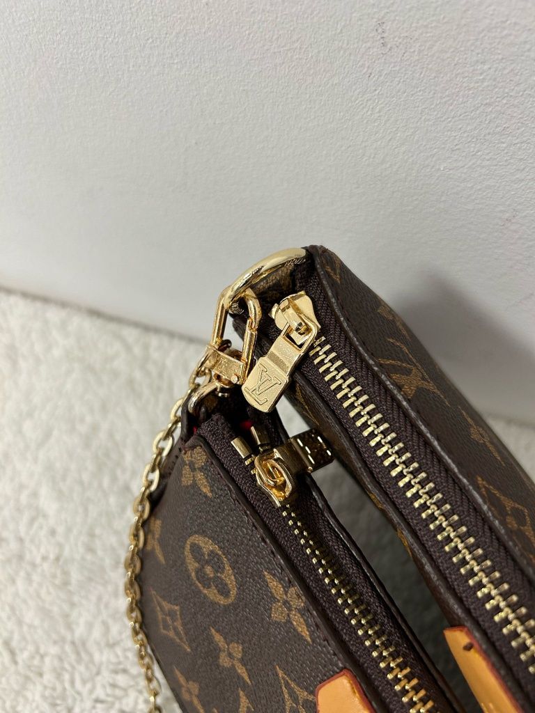 Torebka listonoszka skórzana Louis Vuitton Multi Pochette Premium