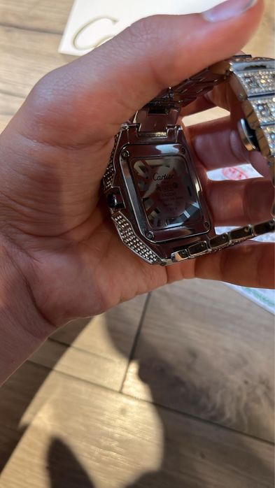 Cartier santos skeleton iced out