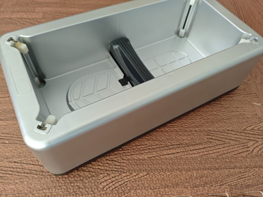 Dispensador automático de capas para sapatos