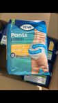 Pieluchomajtki Tena proskin protect+ L normal 28szt