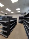 Прилавки та стелажі металеві для магазинів у наявності на складі