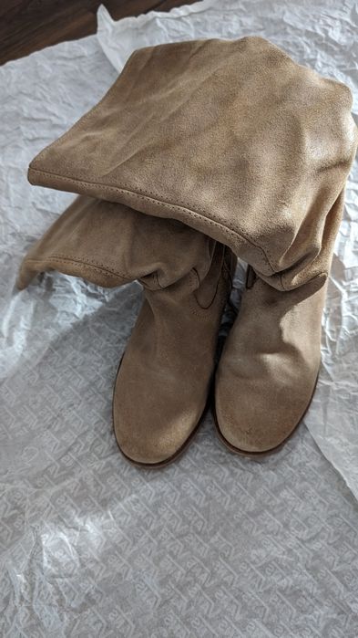 Bota cano alto em pele
