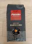 Kawa Piacetto Espresso Supremo  - palona ziarnista.
Kompozycja Arabiki