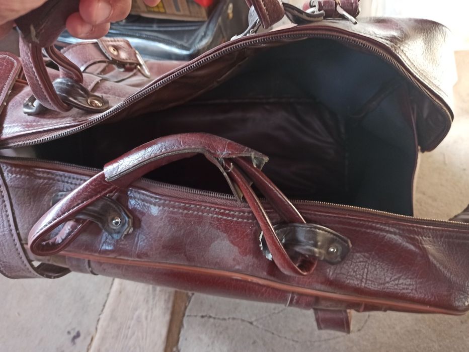 Дорожні сумки, чемодани