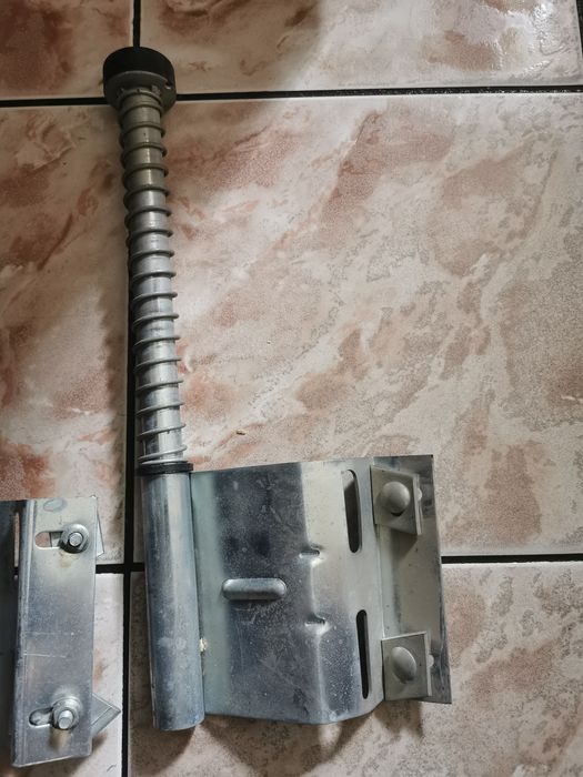 Odbojniki sprężynowe do bramy garażowej