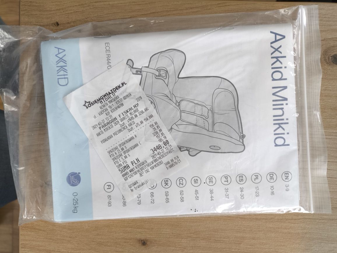 Sprzedam 2x foteliki Axkid Minikid 2 (0–25 kg) + podkładka poziomująca