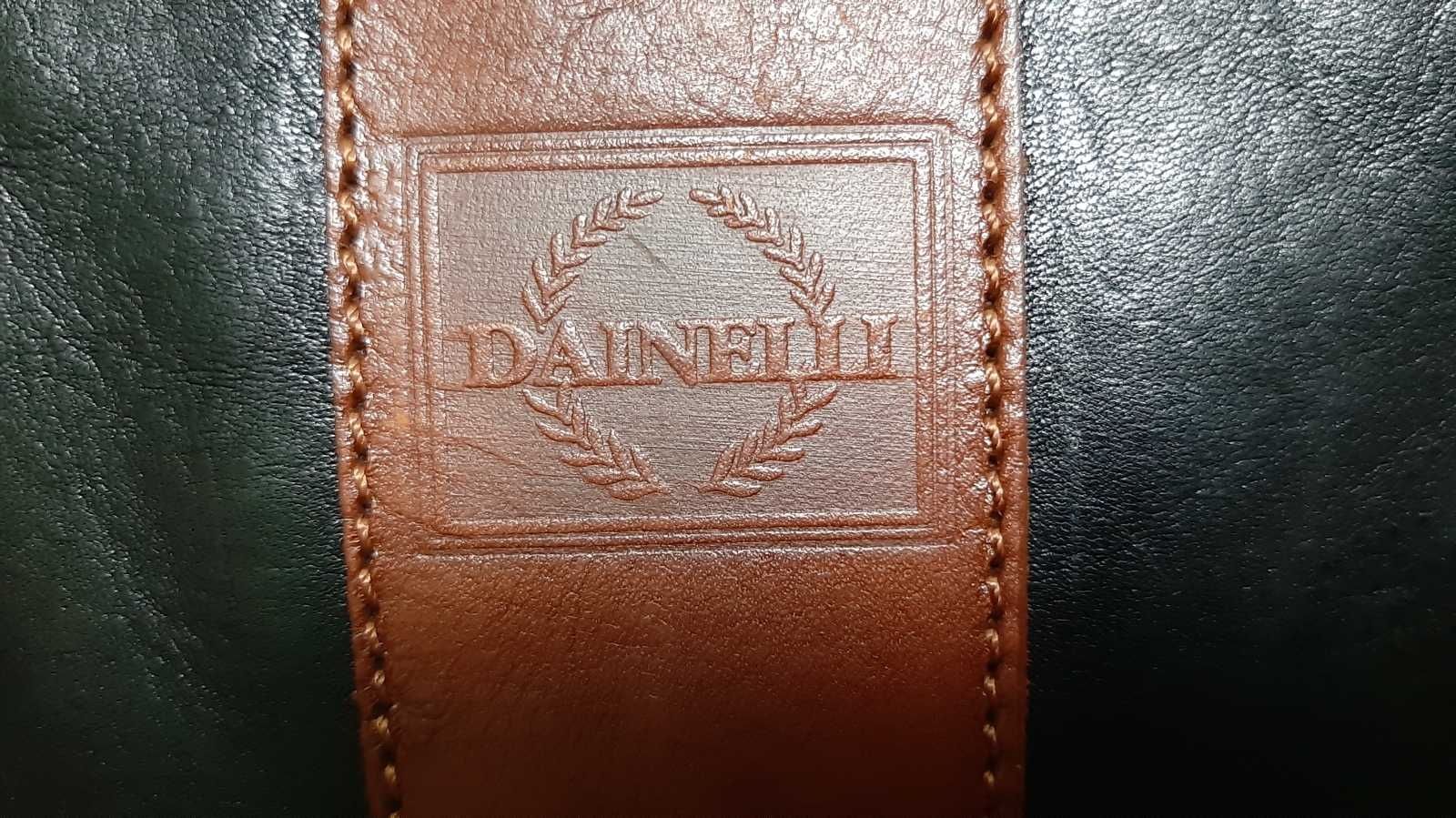 Женская кожаная сумка итальянского бренда Dainelli
Цвет чёрный