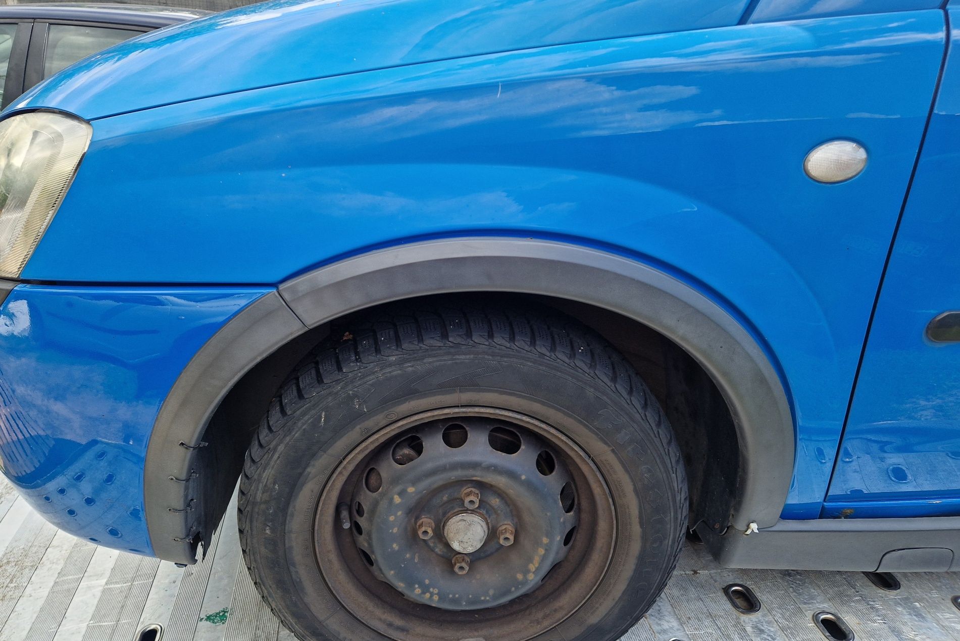 Blotnik Przód Opel Corsa C  Z20a