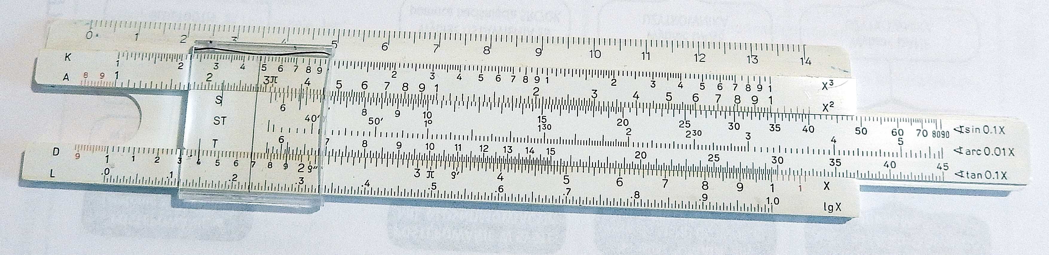 Suwak logarytmiczny Faber – Castell + Instrukcja obsługi po niemiecku.