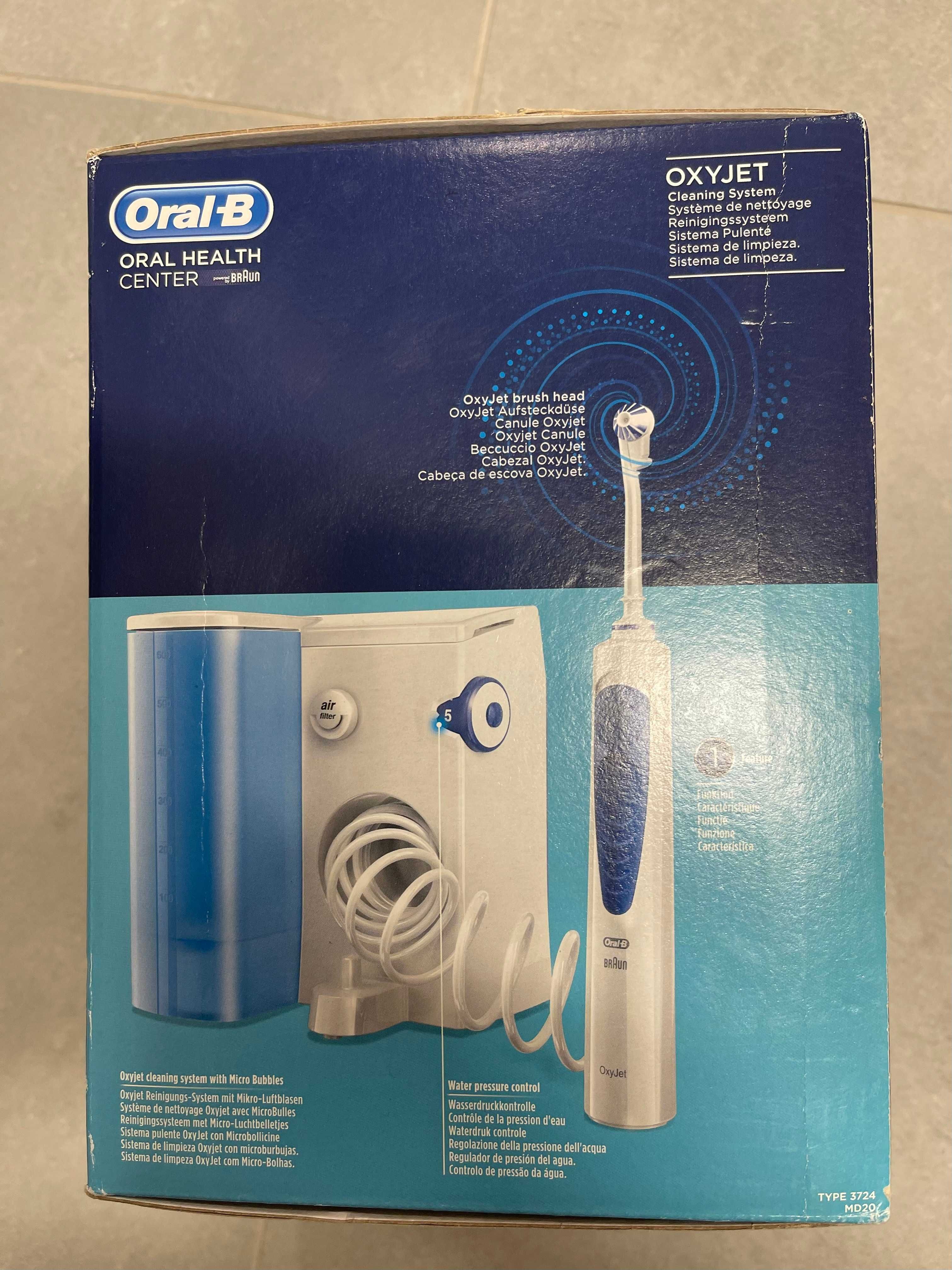 Oral-B irygator stacjonarny + elektryczna szczoteczka + końcówki !!