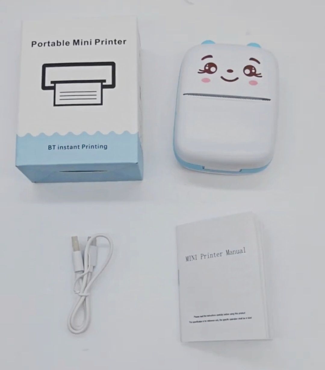 Mini drukarka do smartfona + 10 rolek papieru.