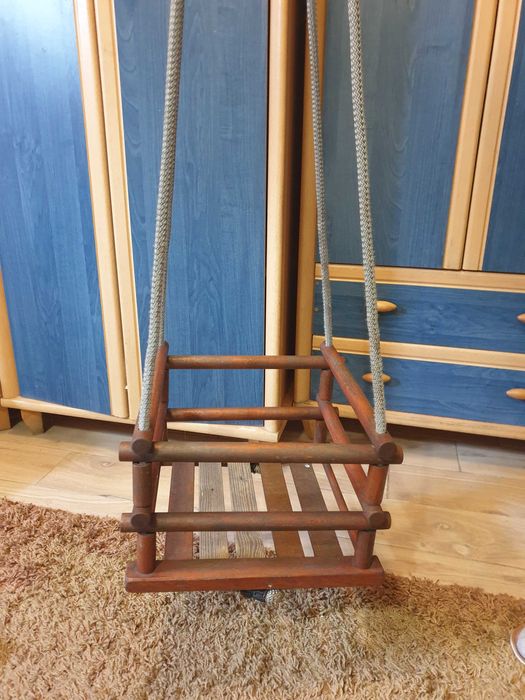 Sprzedam drewniana hustawke dla dziecka