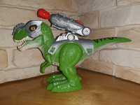 Dinozaur-zabawka posiada efekty świetlne i dźwiękowe,chodzi i strzela.
