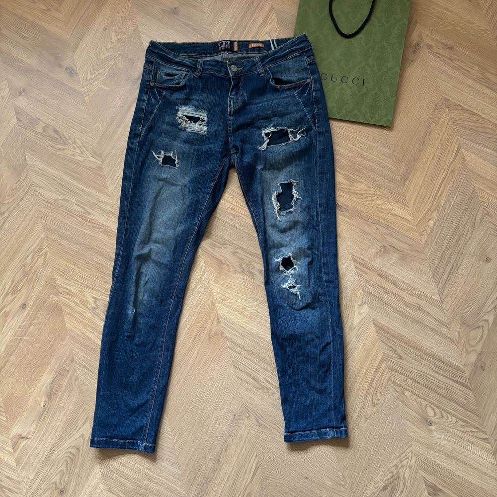 Spodnie damskie jeansy z dziurami granatowe House S boyfriend śliczne