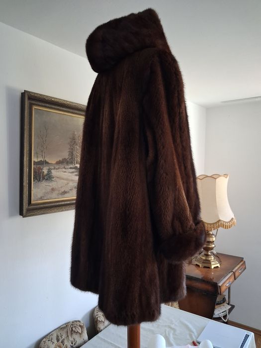 Norki.. futerko koloru brązowego z kapturem