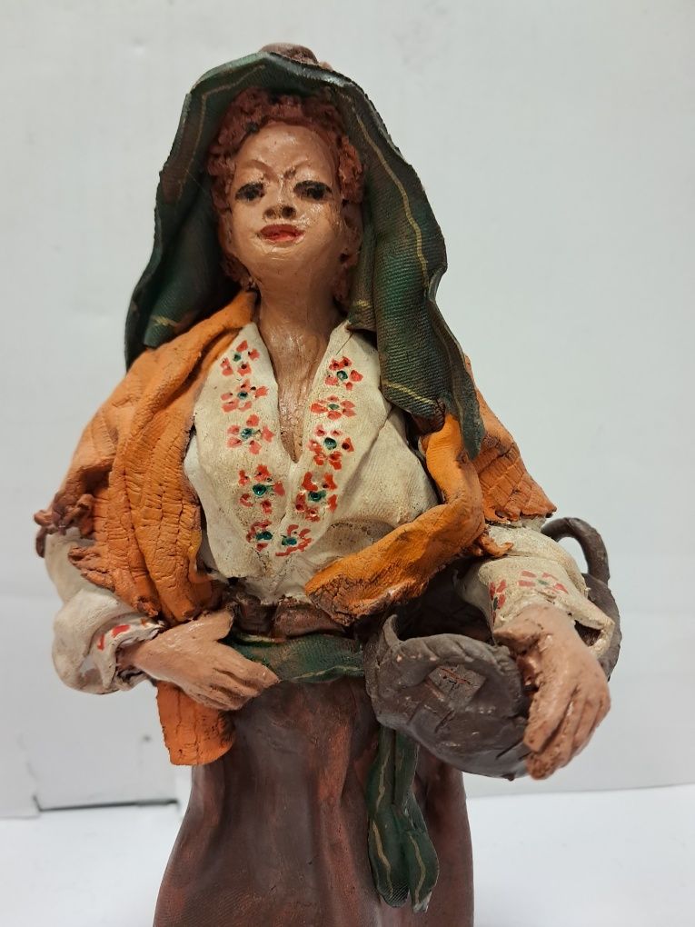Par de figuras em barro