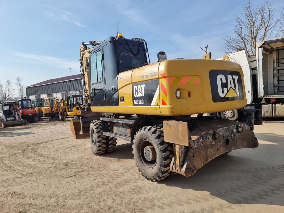 Продам колесный экскаватор Caterpillar М 316 D , 2012 г