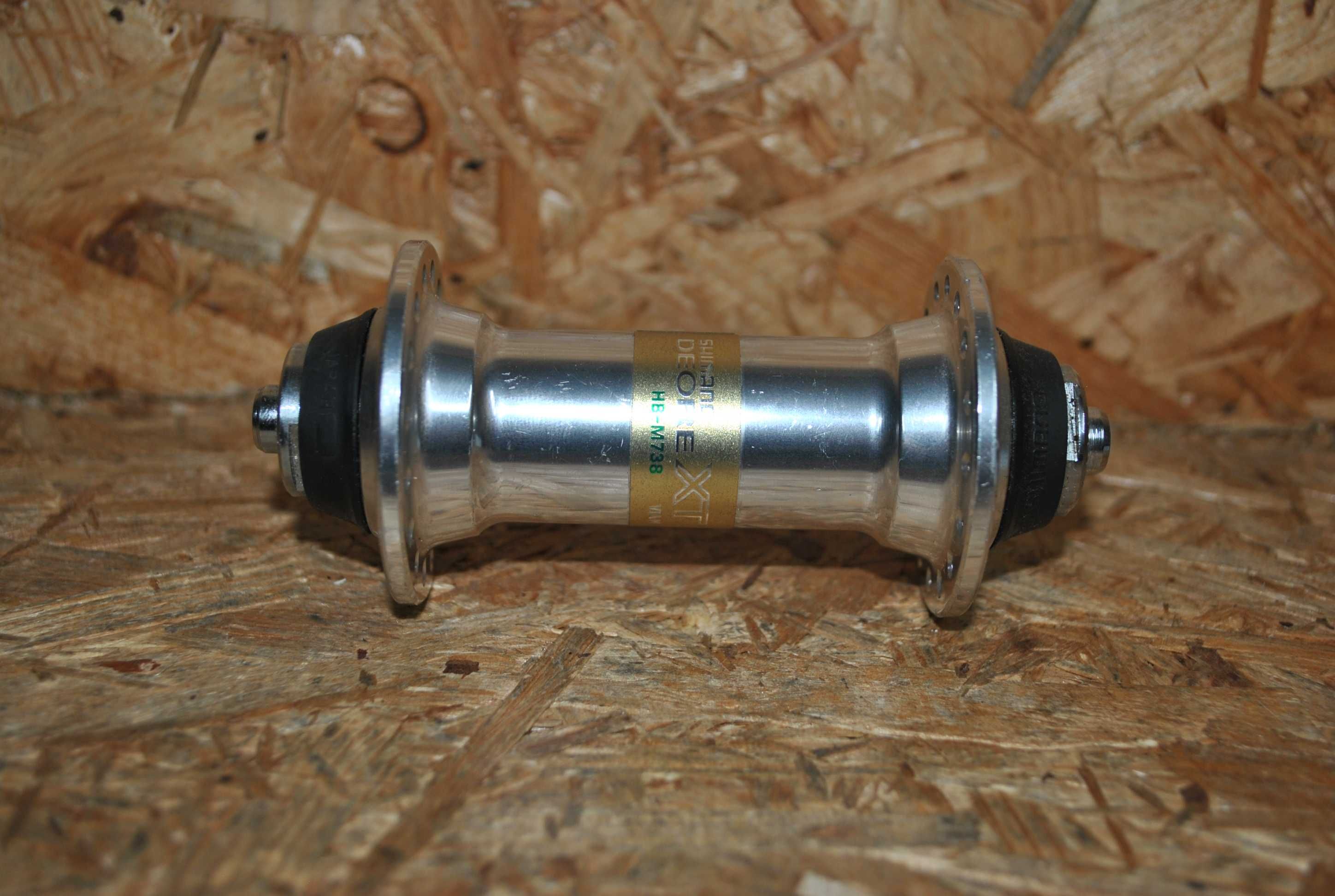 Nowa przednia piasta Shimano DEORE XT, HB-M738, 32h