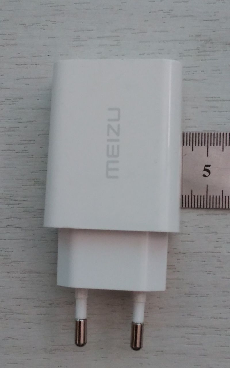 Зарядний пристрій " meizu " model UP 1220E .output 5v OR 9V OR 12V-2A.