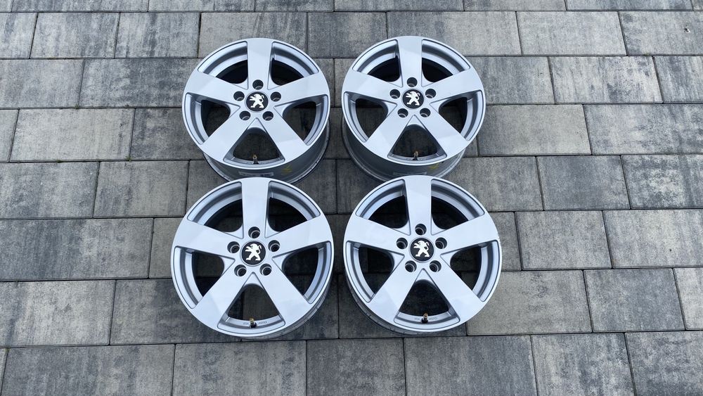 Felgi aluminiowe Dezent do Peugeot 308 5x108 15 cali