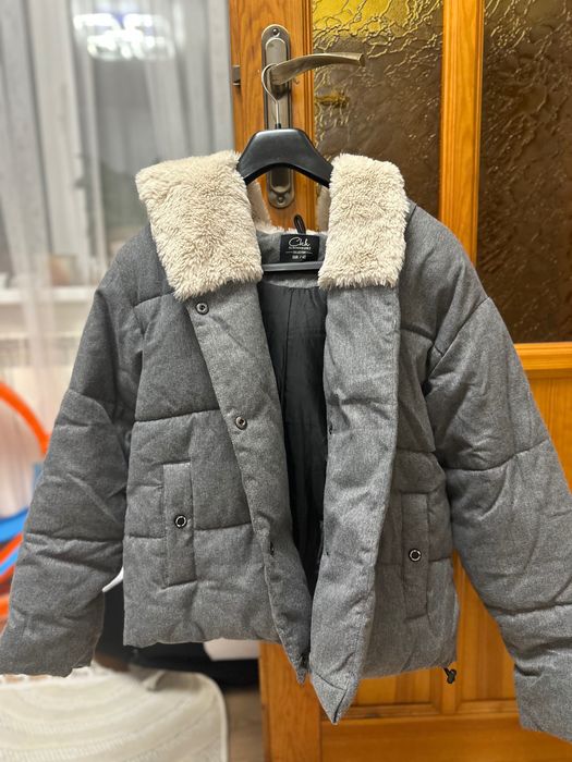 Курточка тепленька в ідеальному стані можна сказати нова