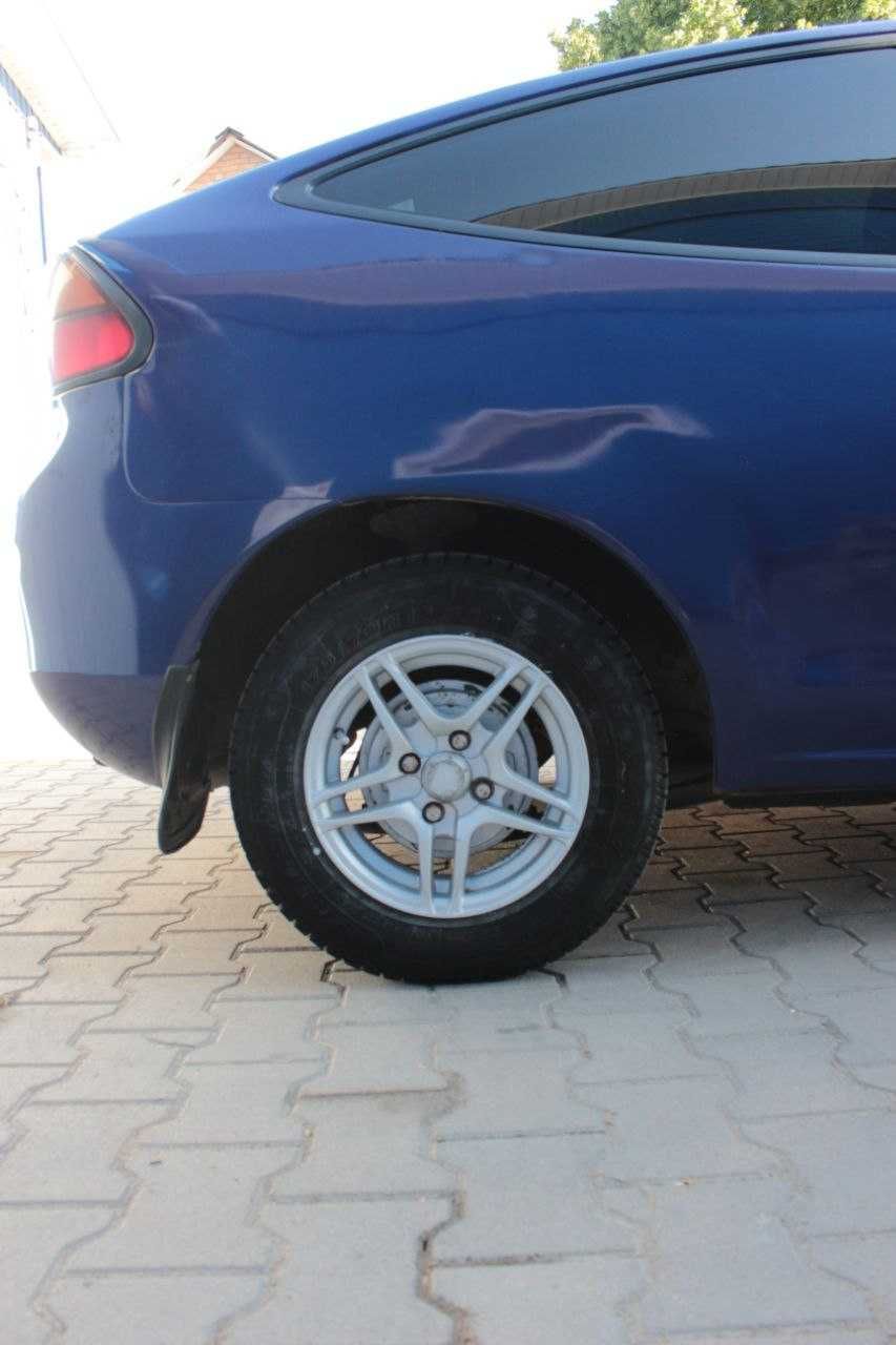 Мазда 323 f Mazda 323 BA f 1/3 газ бензин