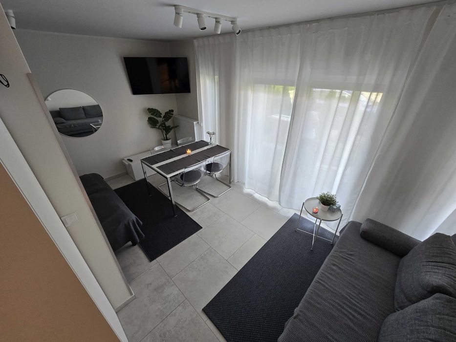 Uroczy apartament z ogródkiem blisko plaży i latarni Niechorze