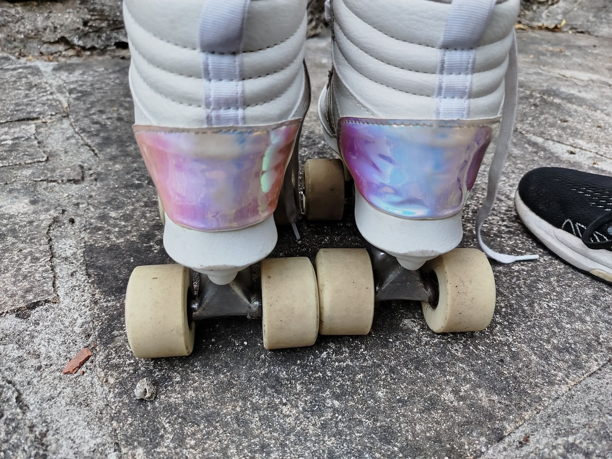 Patins brancos da oxelo.
