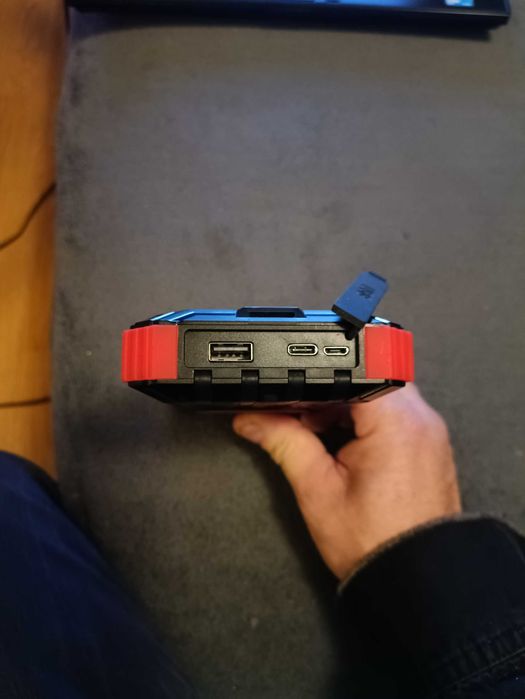 Power Bank 906511. panel solarny 31200mAh ładowarka indukcyjna 4 kable