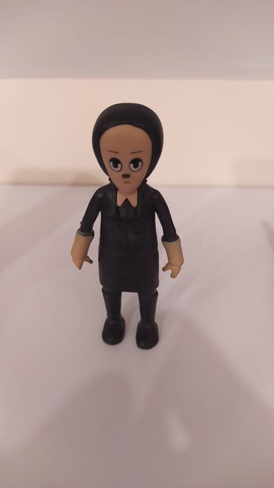 Персонажі з "Сімейки Адамсів