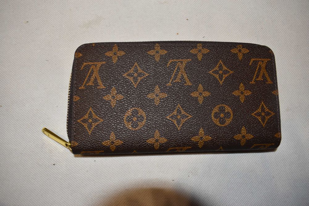 Louis Vuitton portfel jak nowy nr seryjny
