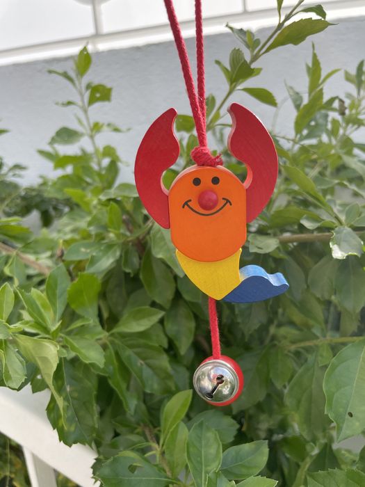 Pequenos mobiles signos, em madeira