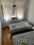 Cama em Quarto duplo com terraço exterior- (F) / double room - ladies