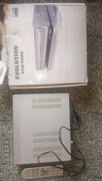 Продам спутниковый ТВ - тюнер Evolution 700s