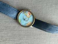 Zegarek z motywem samolotu mapy świata