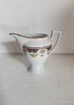 Lindíssima Leiteira Limoges nova, em porcelana - 12 cm