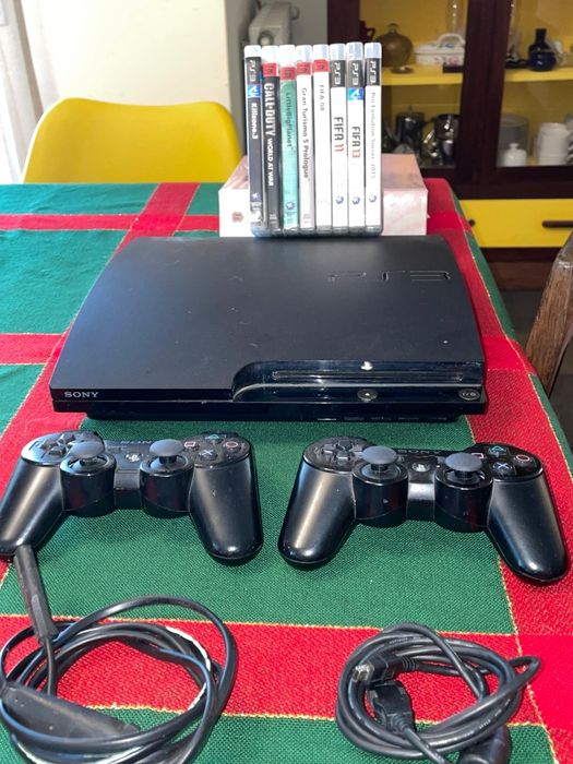 PlayStation 3 + 8 jogos vendo