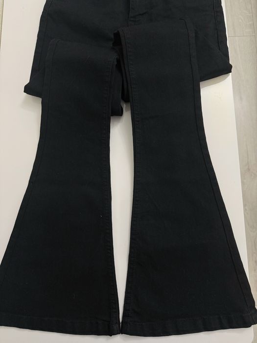 Джинси чорні кльош нові хс