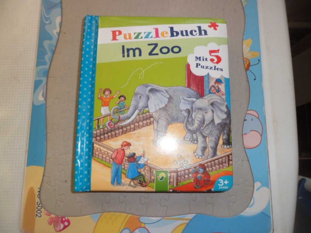 Puzzlebuch im Zoo mit 5  Puzzles  (на німецькій мові )