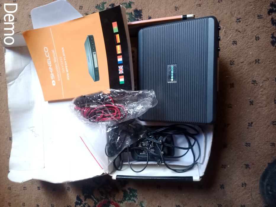 DYD плеер в упаковке с инструкцией